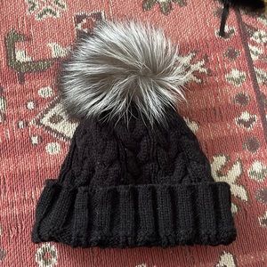 Black beanie with pouf